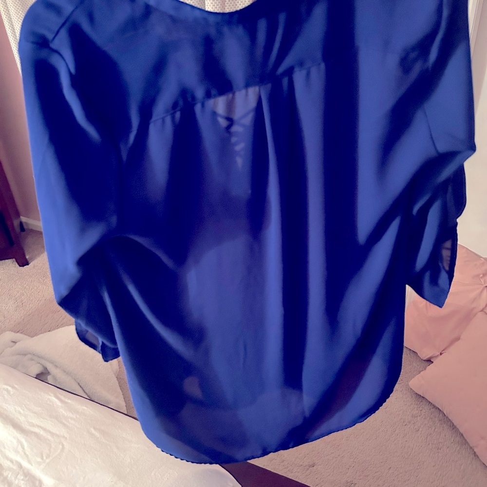 A blue top that is dressier.